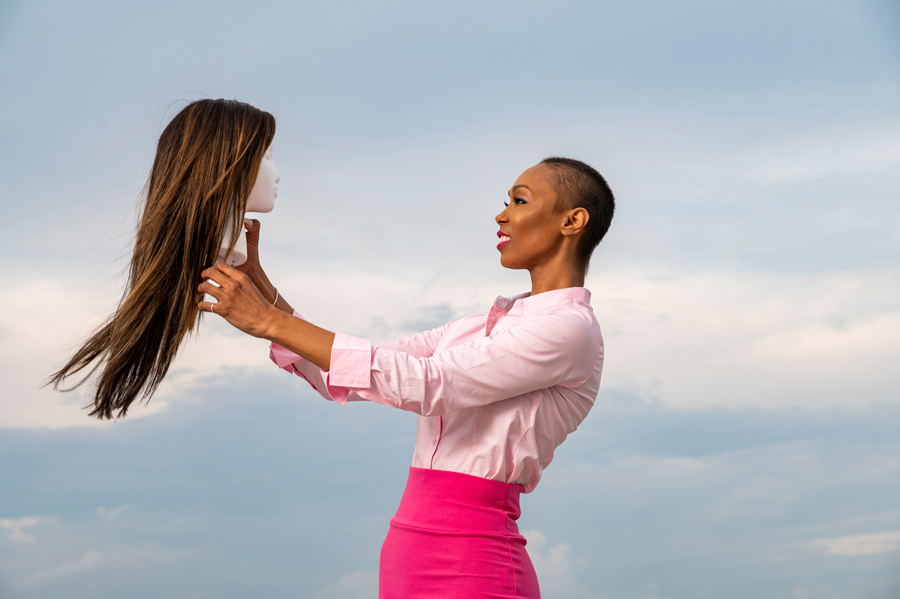 Tralee Hale with the wig she uses as a result of chemotherapy for advanced breast cancer.